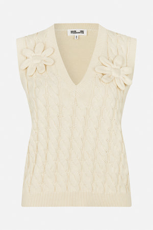 Front view of an ivory knitted sleeveless vest with a V-neck, cable pattern and raised flower details at the shoulders.