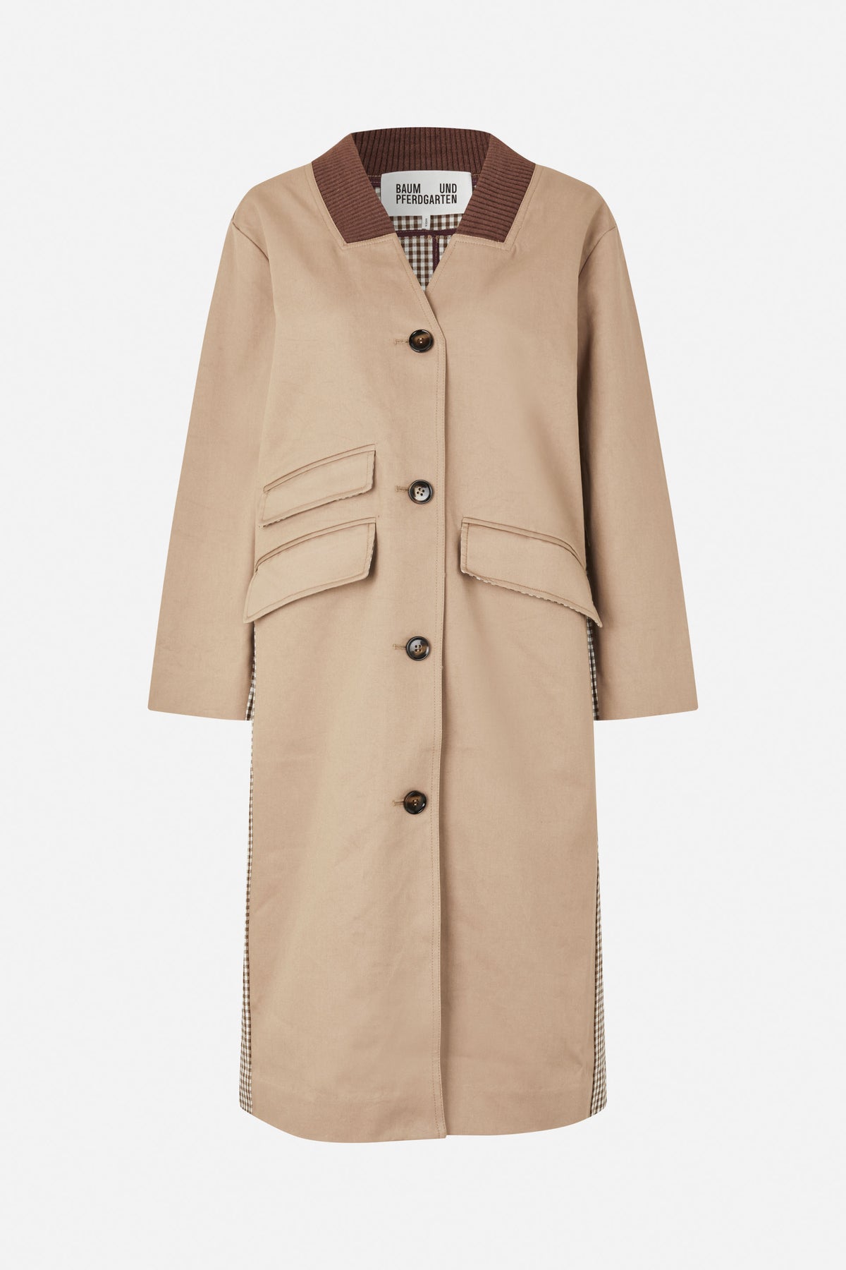 Front view of a long beige coat with dark brown ribbed V-neck trim, brown gingham lining, buttons and flap pockets