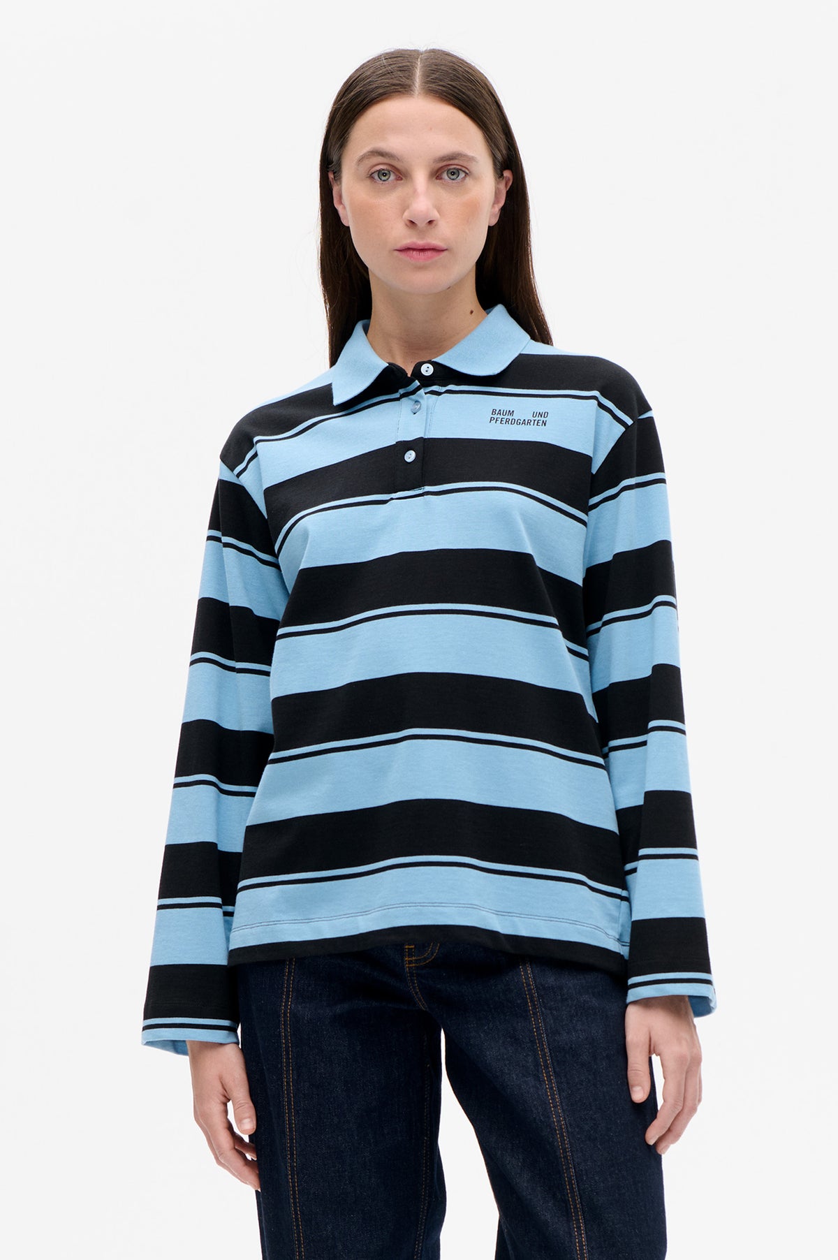 Front view of a long-sleeved polo shirt with broad black and light blue stripes, a light blue collar and button placket.