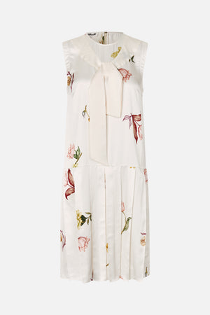 Front view of a sleeveless ivory dress with scattered floral print, a wide neckline tie and a pleated lower skirt.