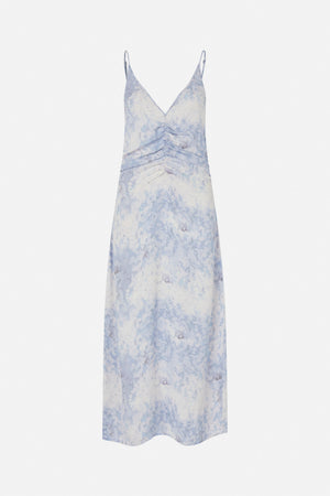 Front view of a long slip dress with thin straps, a deep V-neck, gathered ruching and a pale blue and white abstract print.