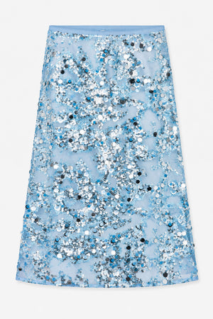 Front view of a light blue A-line skirt covered in dense white, silver, black and blue sequins.