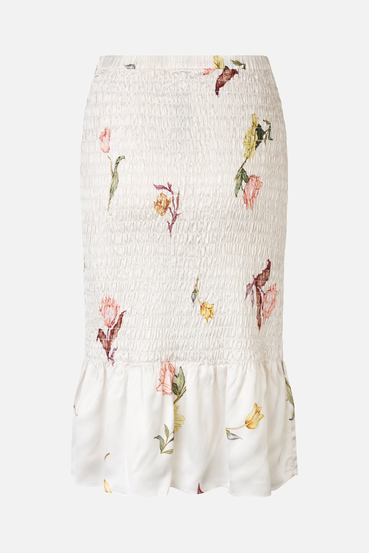 Front view of an ivory skirt with a densely smocked waistband, scattered multicolour floral print and gathered flounce hem.