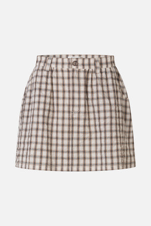 Front view of a cream plaid skirt with brown and black lines, a buttoned waistband and gathered pleats.