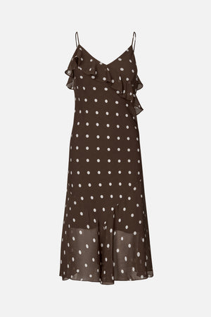 Front view of a brown spaghetti-strap dress with white polka dots, a V-neckline and a cascading ruffle across the bodice.