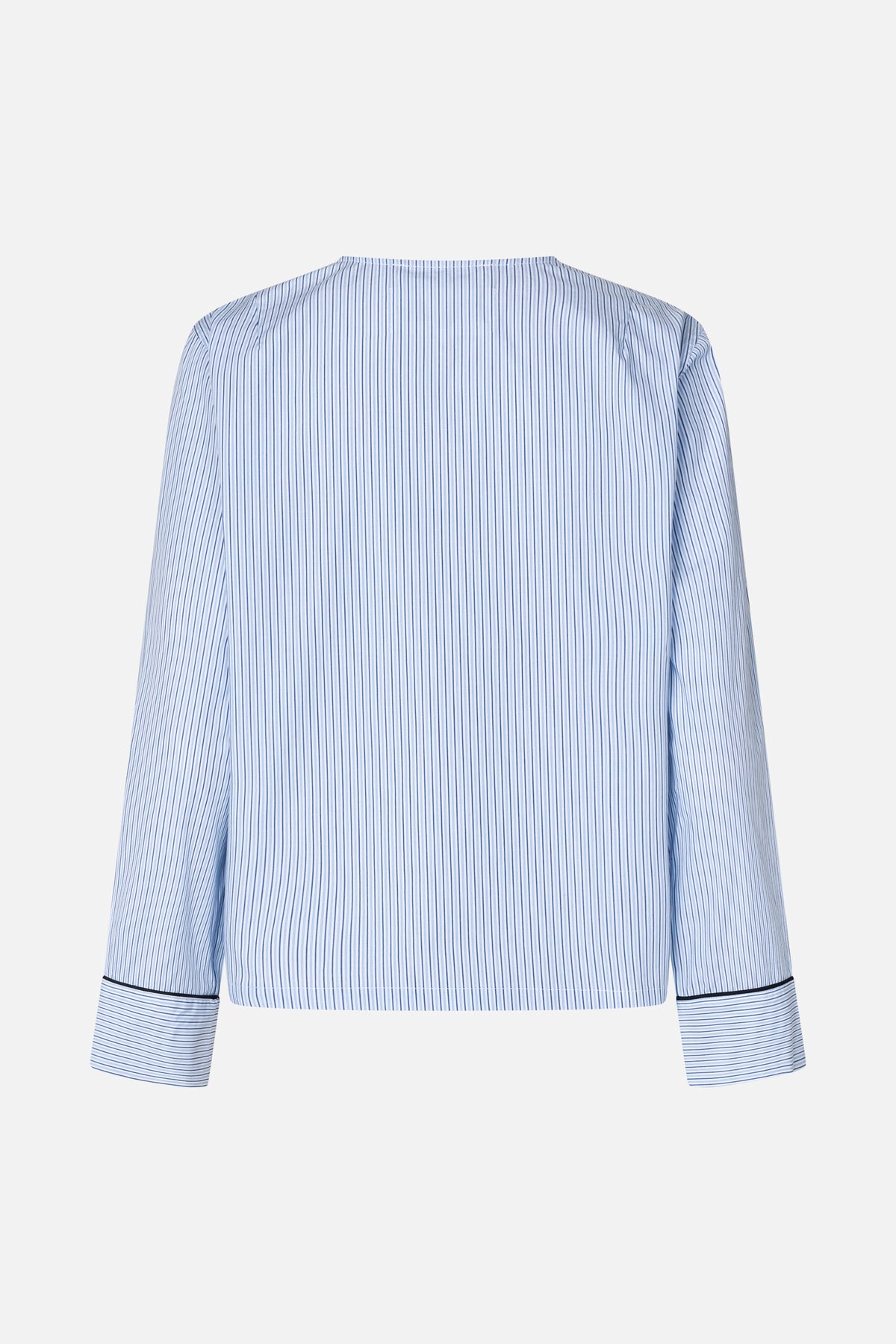 Back view of a long-sleeved white blouse with fine blue vertical stripes, horizontal striped cuffs and black cuff piping.
