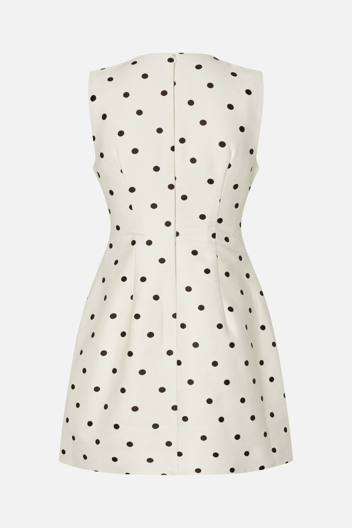 Back view of an ivory sleeveless fit-and-flare dress with black polka dots and a center-back zipper.