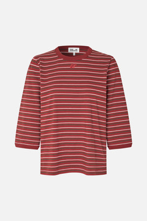 Front view of a long-sleeved crew-neck T-shirt with red, brown and white horizontal stripes and a small embroidered chest logo.