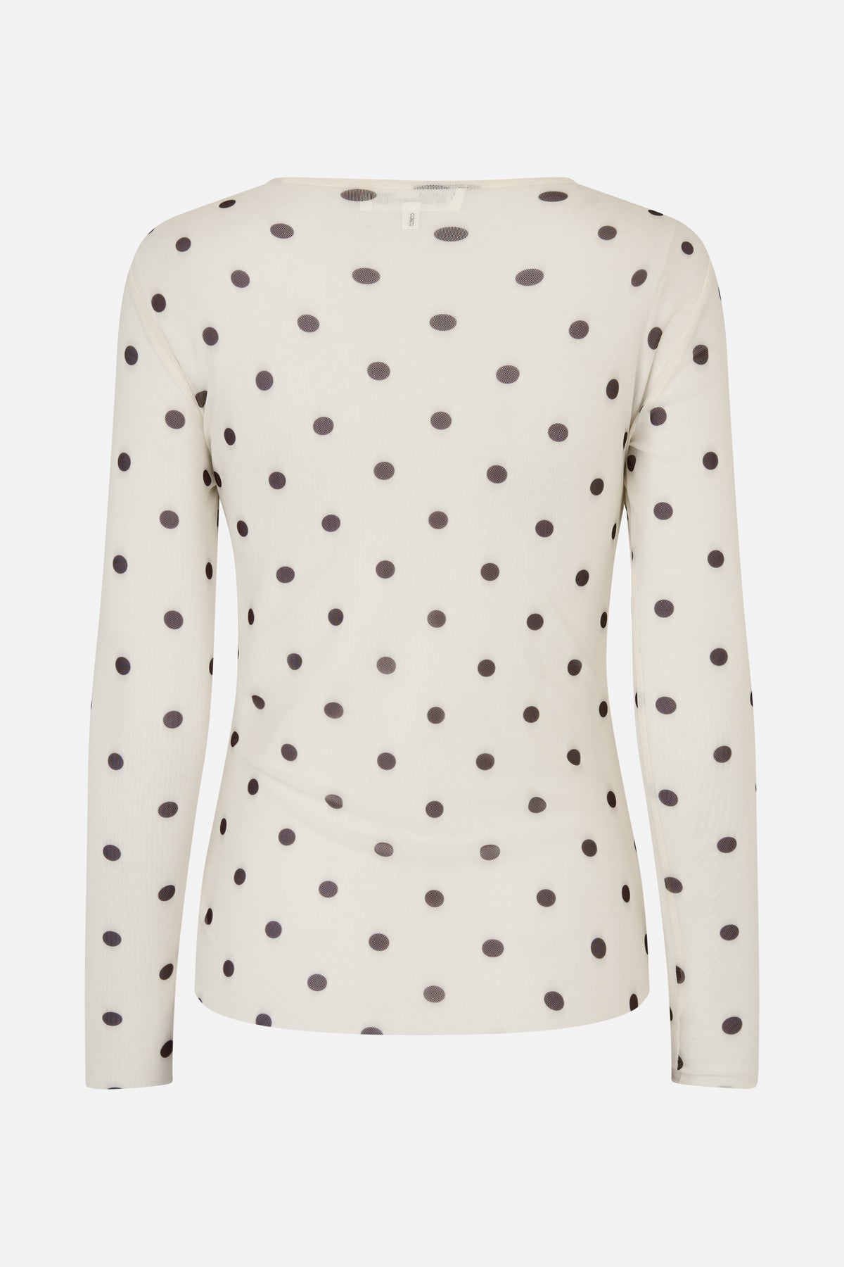 Front view of a cream sheer long-sleeved top with a round neckline and evenly spaced dark polka dots.