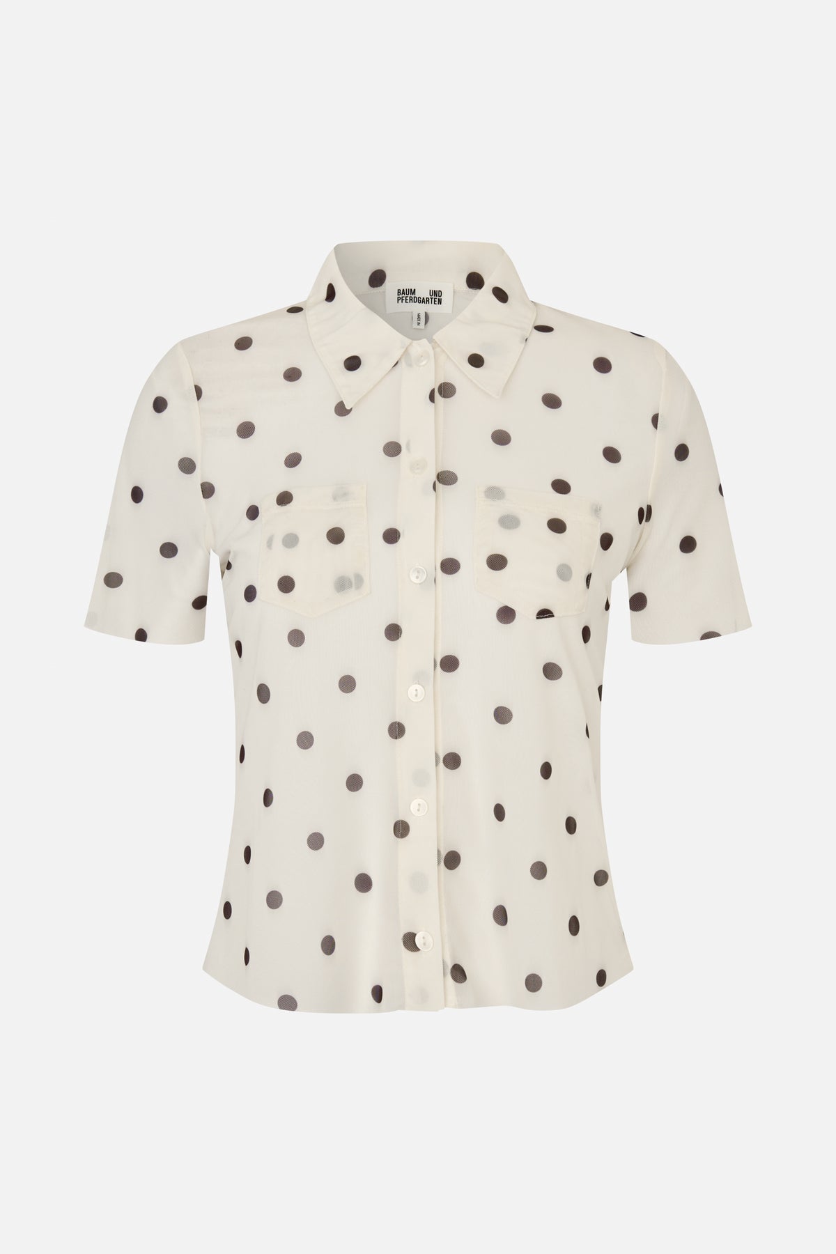 Front view of an ivory short-sleeved button-up shirt with dark polka dots, a pointed collar and two chest pockets.