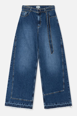 Front view of wide-leg blue denim jeans with contrast stitching, a metal ring belt, large leg panels and frayed hems.