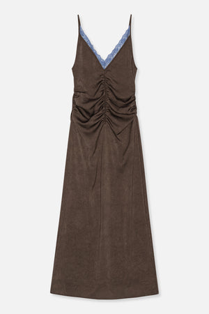 Front view of a long brown slip dress with a blue lace-trimmed V-neck, thin straps, and gathered center-front ruching.