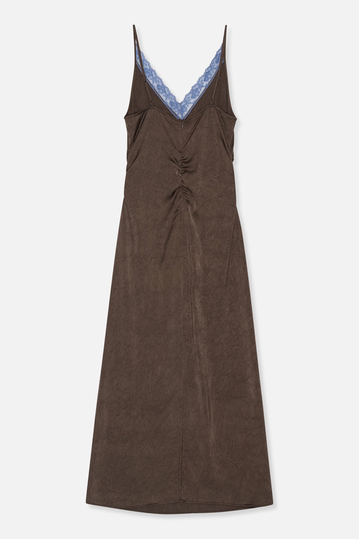 Front view of a long brown crinkled slip dress with thin straps, a deep V neckline trimmed in blue floral lace, and gathered front detailing.