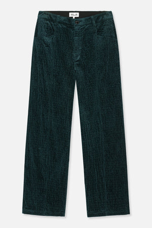 Vorderansicht einer dunkelpetrolfarbenen Cordhose mit geradem Bein, geknöpftem Bund und seitlichen Eingrifftaschen.