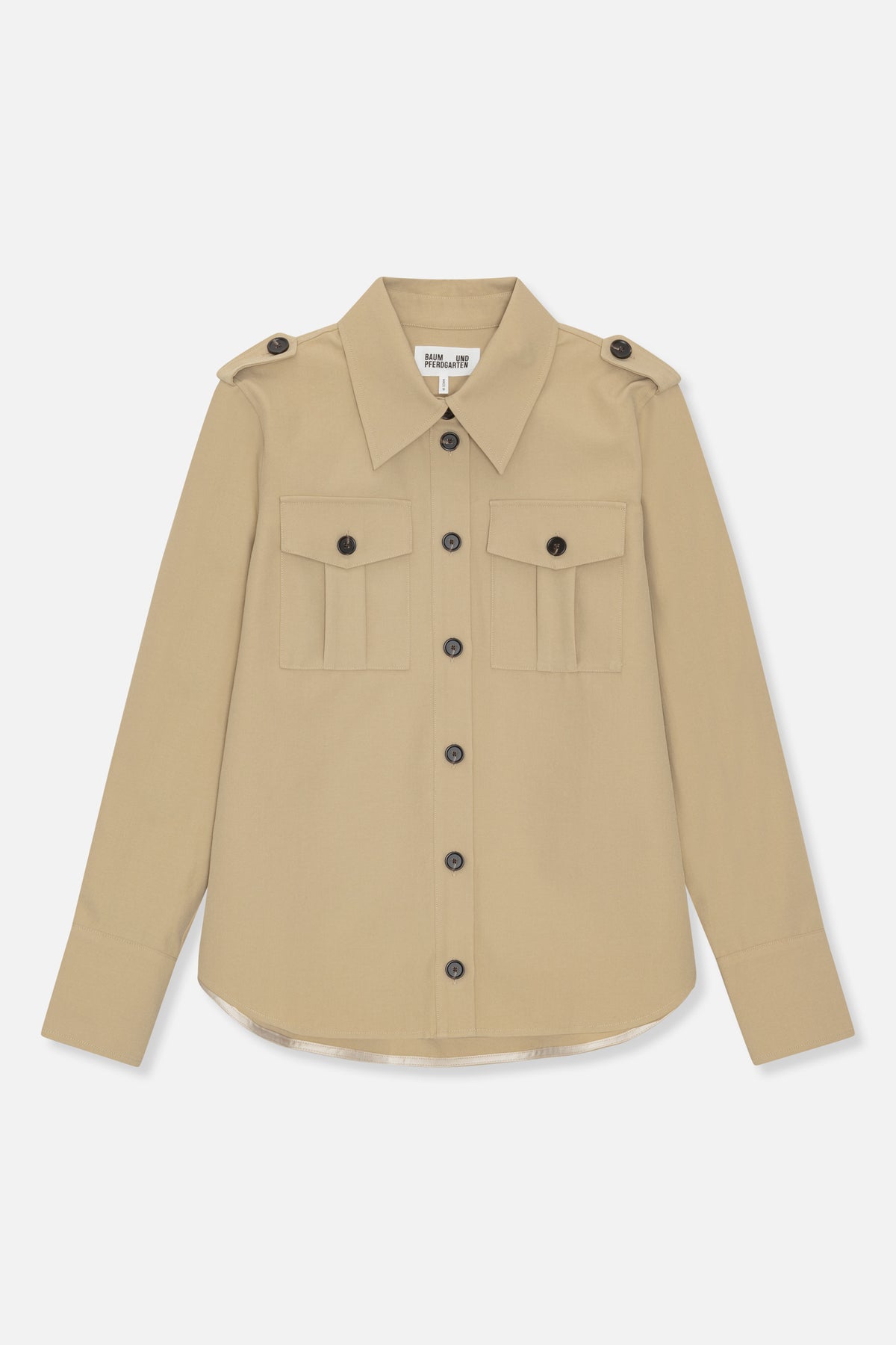 Front view of a beige long-sleeved button-up shirt with a pointed collar, shoulder tabs and two buttoned chest pockets.