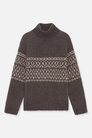 Front view of a dark brown fuzzy knit sweater with a high round neck and cream Fair Isle pattern across the chest and sleeves.