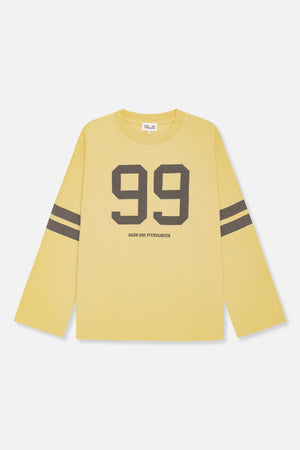 Front view of a yellow long-sleeved T-shirt with a large dark gray “99” graphic, matching sleeve stripes and chest lettering.