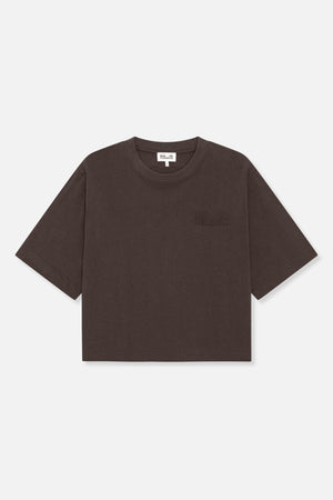 Front view of a dark brown short-sleeved T-shirt with a crew neck and subtle tonal chest lettering.