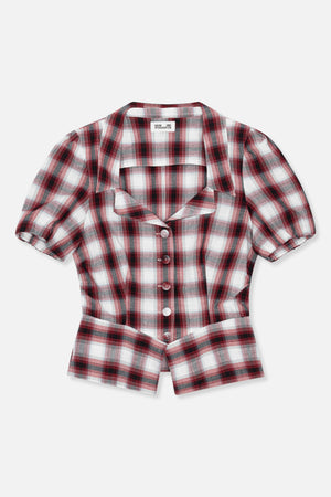 Front view of a red, black, grey and white plaid blouse with a pointed collar, puffed short sleeves and button front.