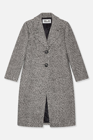 Front view of a long black-and-cream chevron-pattern coat with notched lapels, two dark buttons and welt pockets.