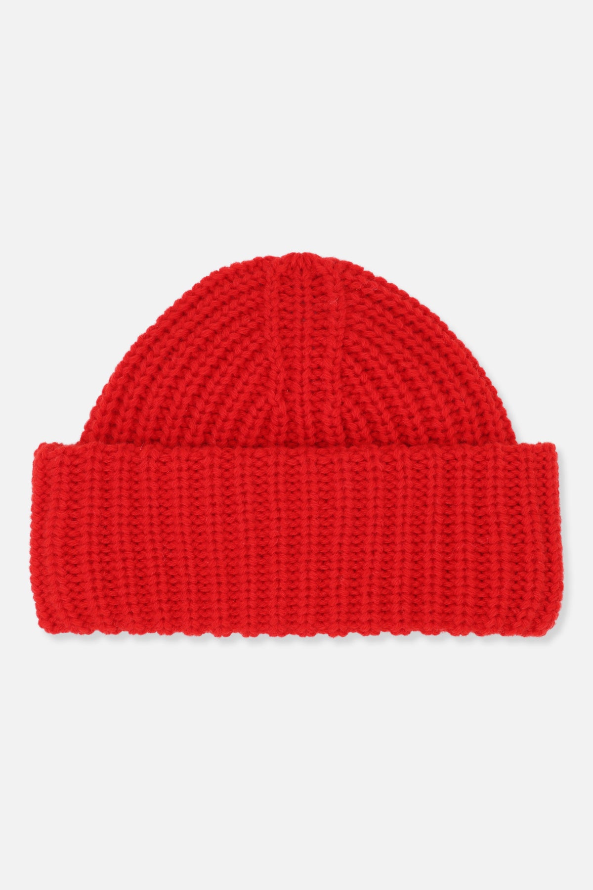 Bright red chunky-knit beanie with a folded cuff, shown from the front.