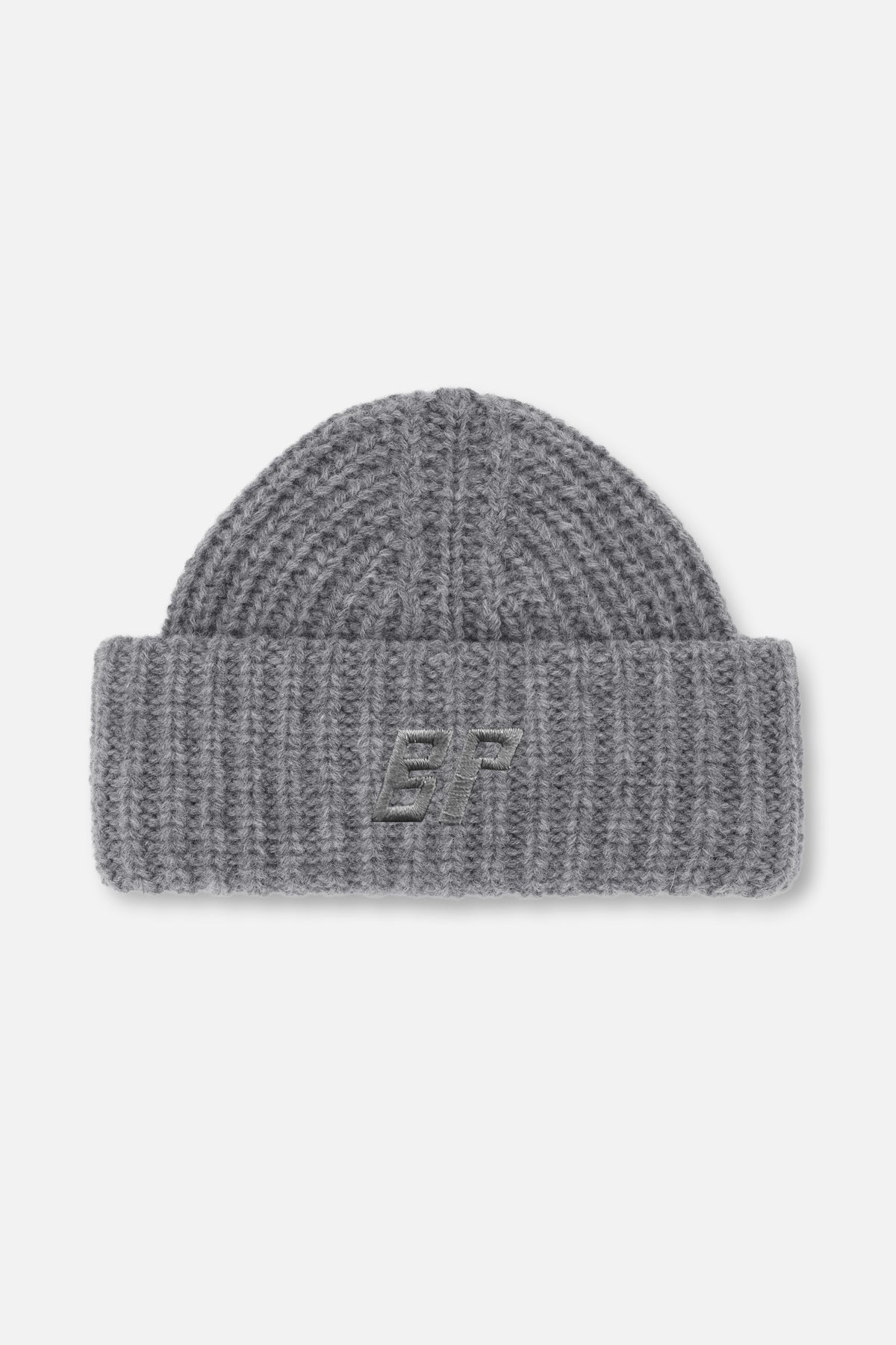 Grey chunky knit beanie with a folded cuff and embroidered monogram, shown from the front.