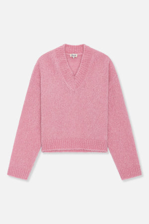 Front view of a pink fuzzy knit sweater with a deep V-neck, long sleeves and ribbed trim.