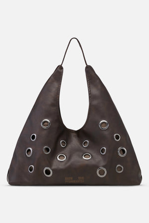 Dark brown shoulder bag with a long strap and multiple silver metal eyelets across the front