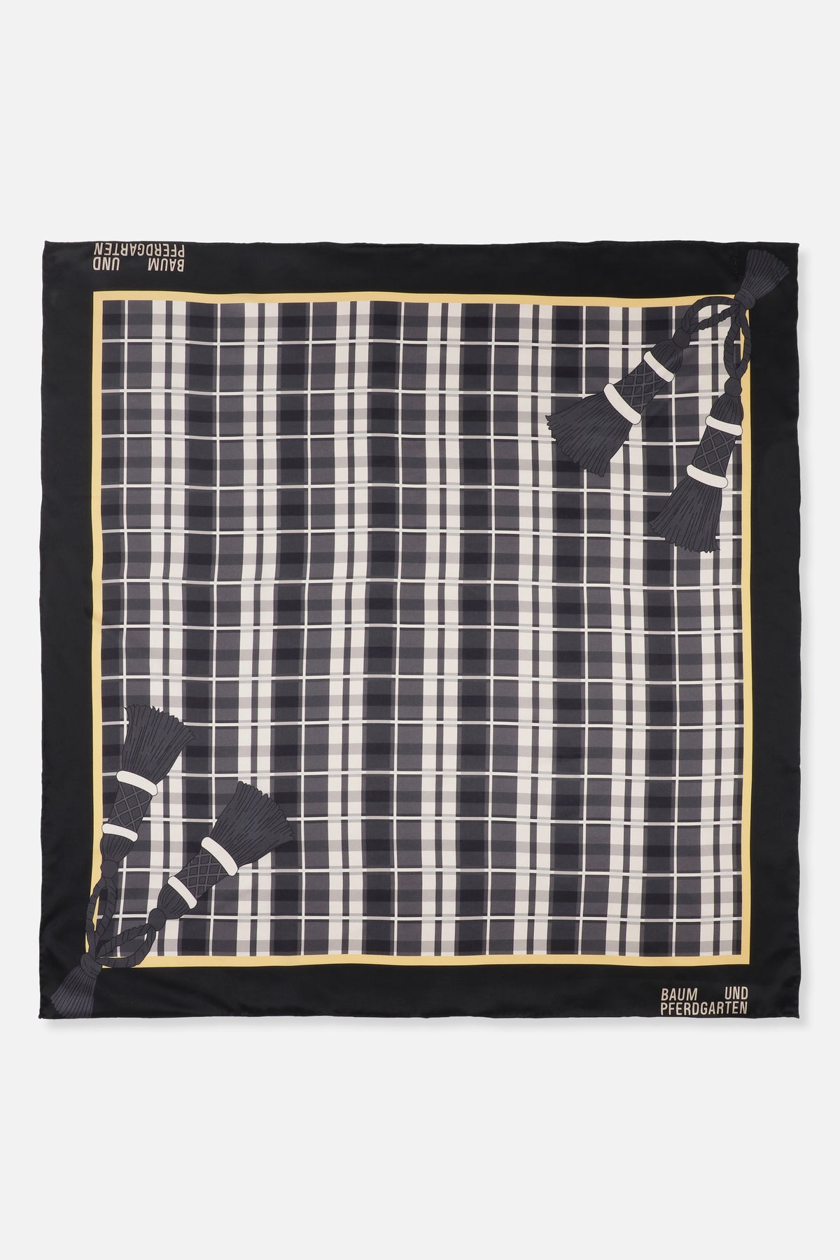 Square scarf with a black border, yellow-edged grey and cream plaid centre, illustrated tassels and Baum und Pferdgarten lettering.