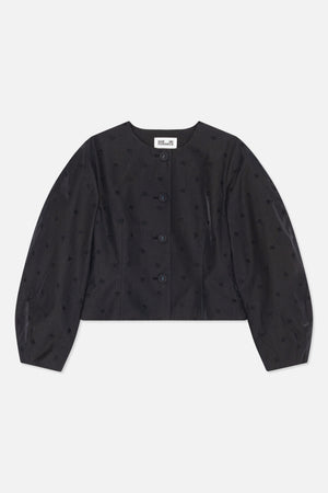 Front view of a black cropped jacket with a round neckline, long voluminous sleeves, front buttons and scattered tonal embroidered motifs.