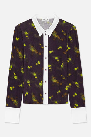 Front view of a long-sleeved collared shirt with a dark floral print, white collar, button placket and cuffs.