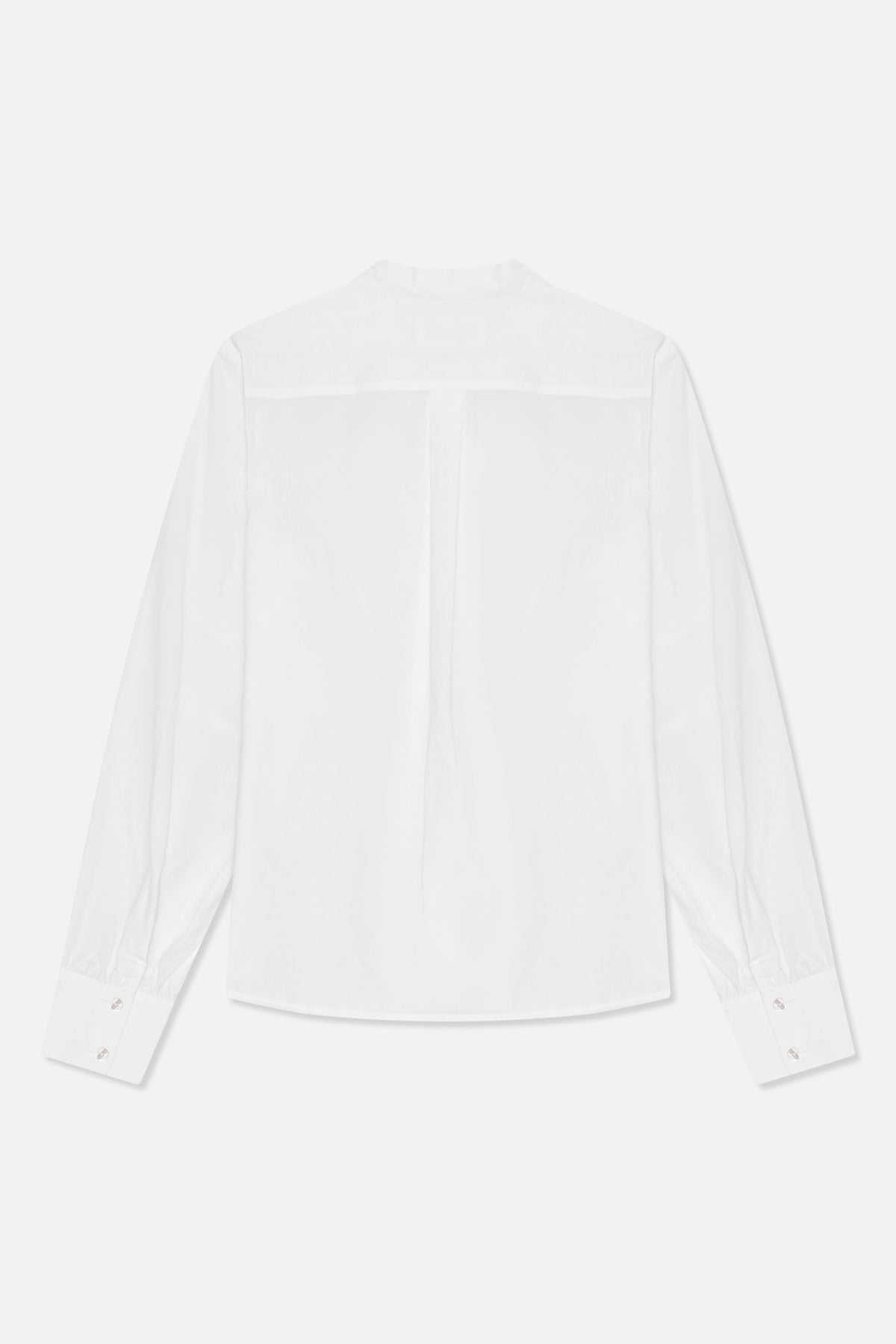 Back view of a white long-sleeved shirt with a stand collar, back yoke, and buttoned cuffs.