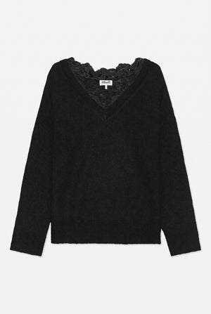 Front view of a black long-sleeved knit top with a V-shaped lace-trimmed neckline.