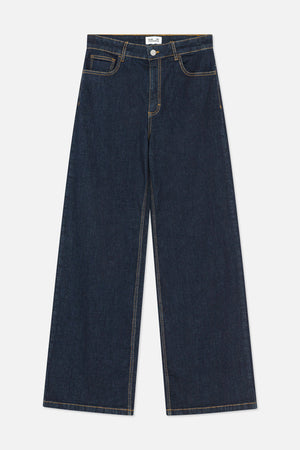 Front view of dark indigo jeans with wide straight legs, contrast gold stitching, belt loops, button closure and front pockets.