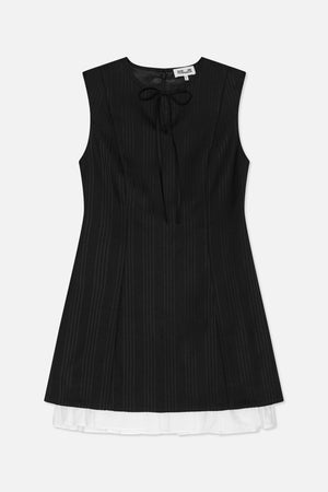 Front view of a black sleeveless mini dress with subtle vertical stripes, a bow-tied zip neckline and a white ruffled hem.