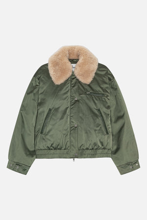 Front view of an olive green jacket with a large beige plush collar, snap-button closure, zip chest pocket and elasticated hem.