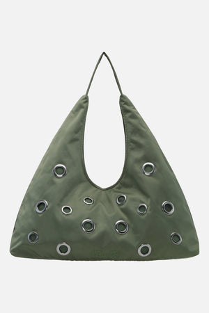 Front view of a sage green shoulder bag with a long strap, large cutout handle, and scattered silver eyelets.